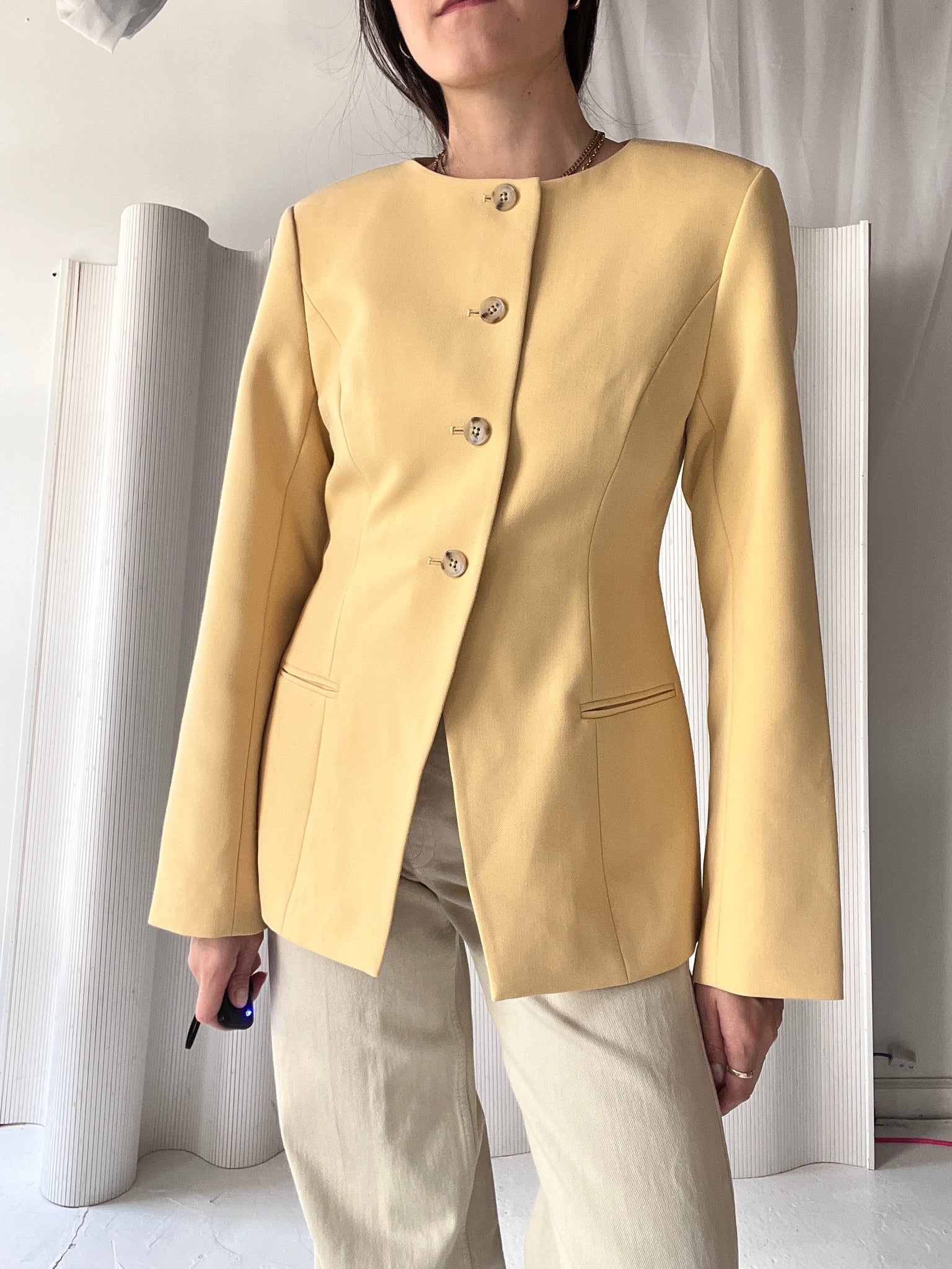 yellow collarless blazer