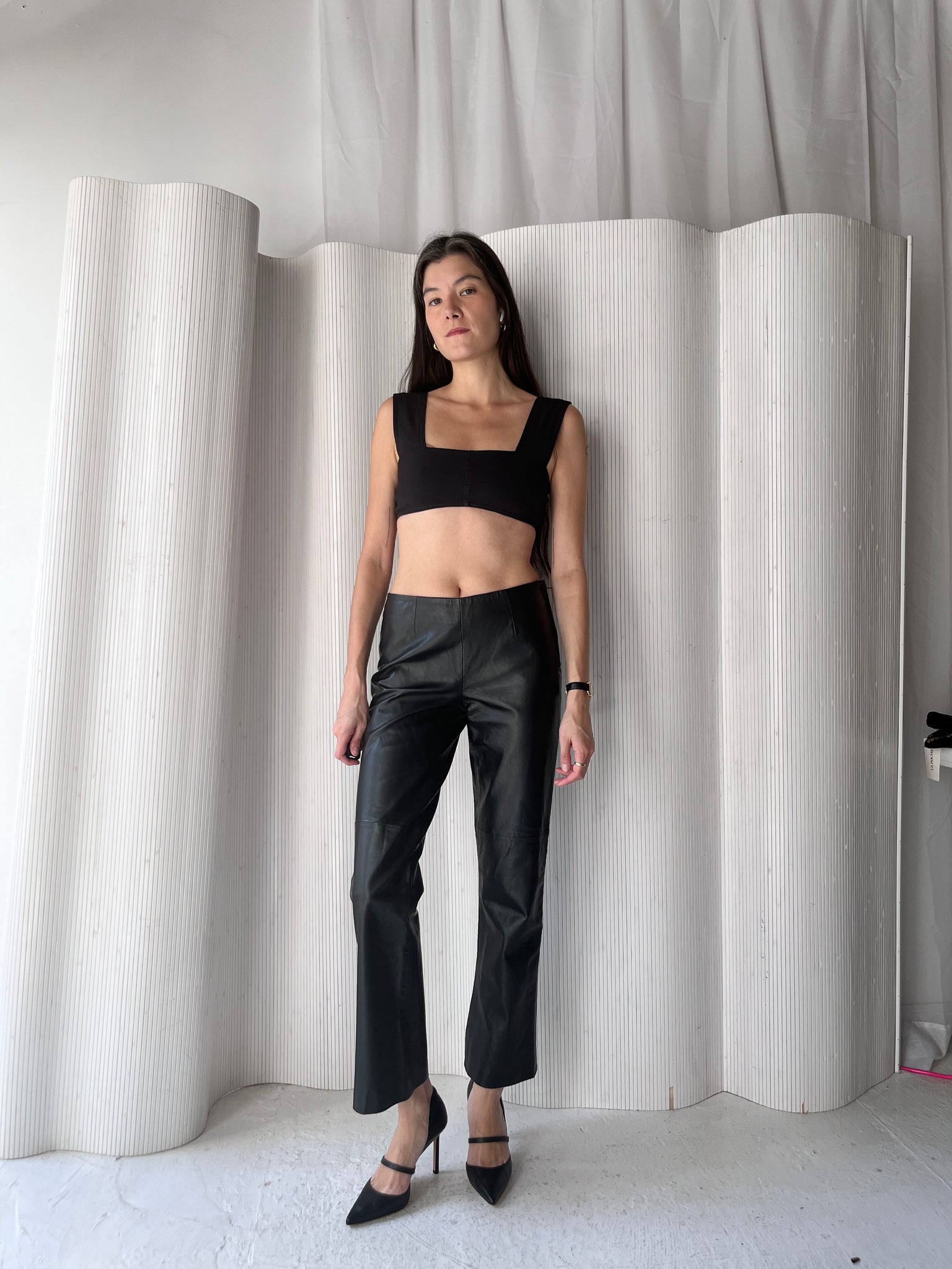 Black leather low rise pants