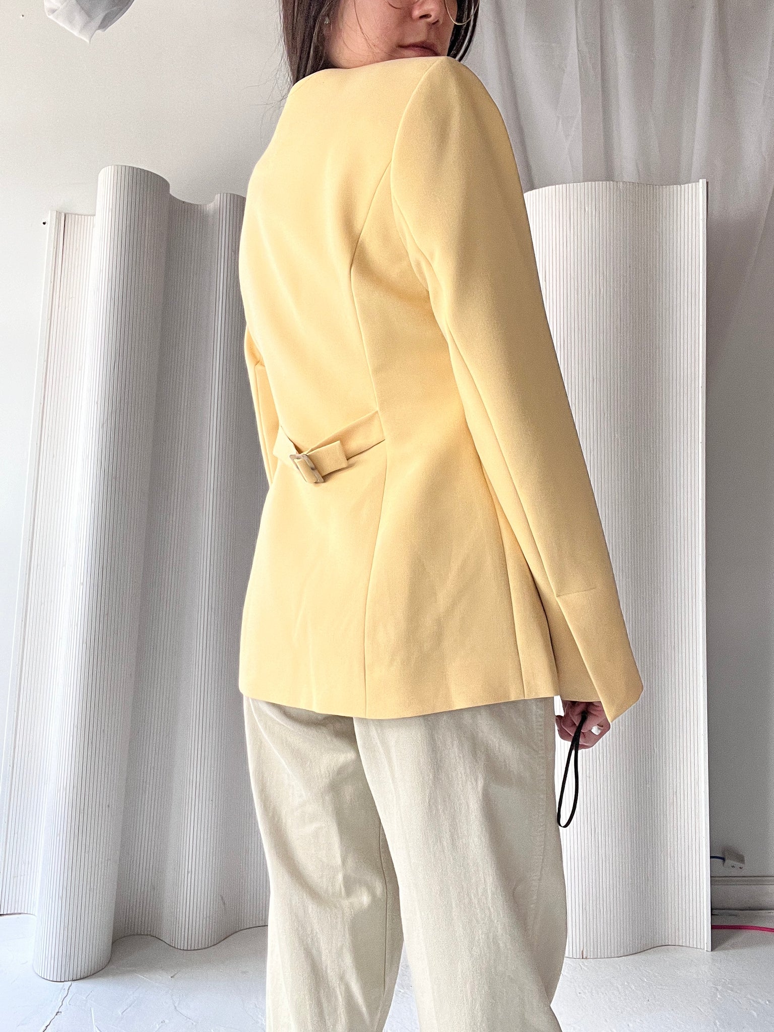 yellow collarless blazer