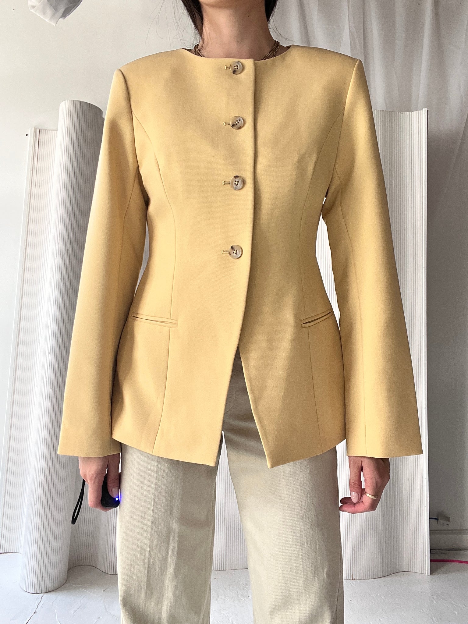 yellow collarless blazer