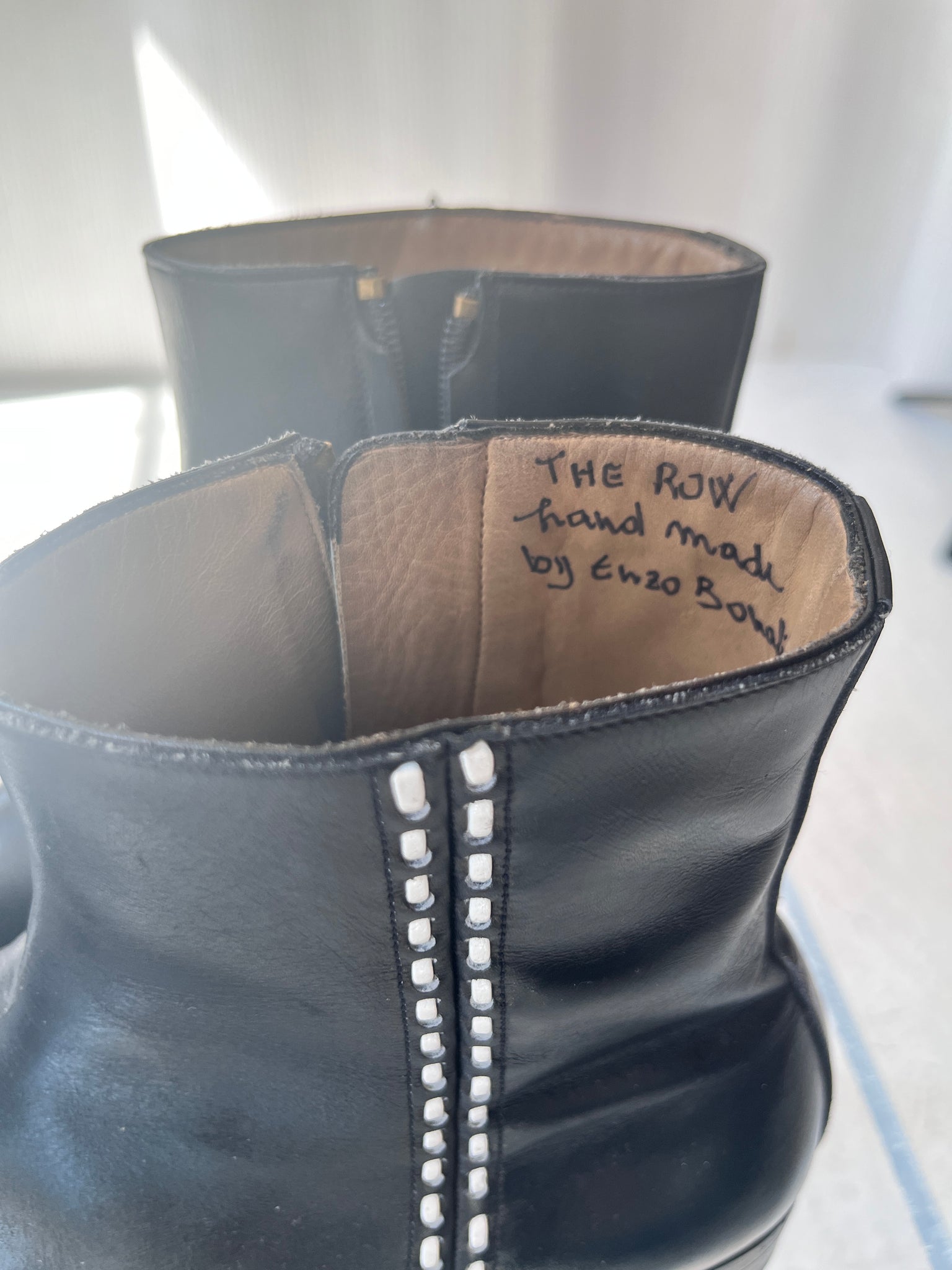 The Row black leather boot