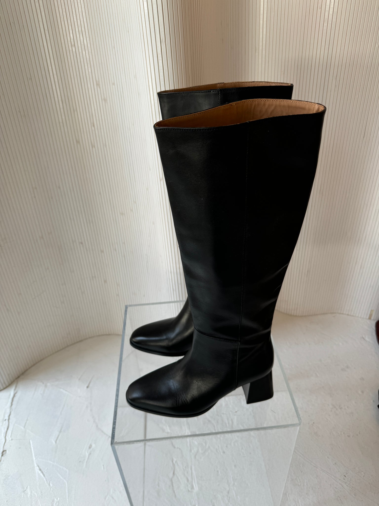 Flattered leather knee high boot