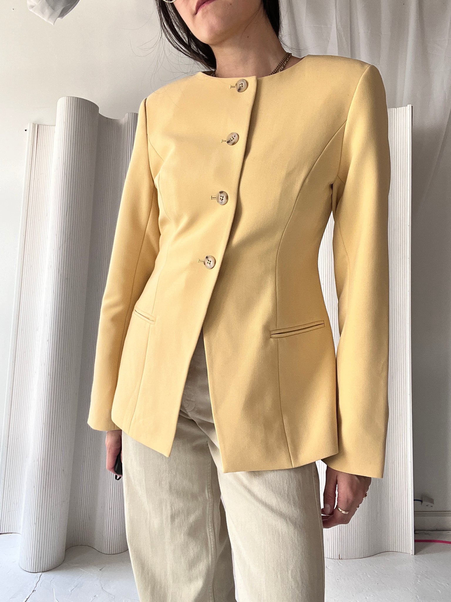 yellow collarless blazer