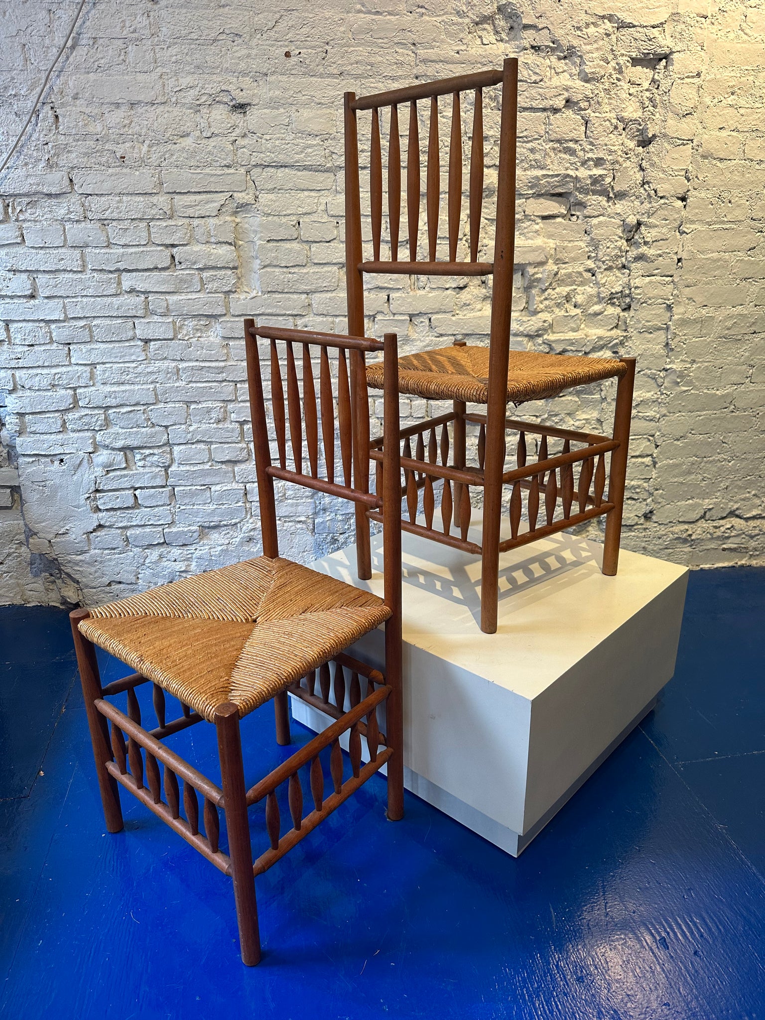 Two (2) vintage French Rush Chairs with beautiful wood detail